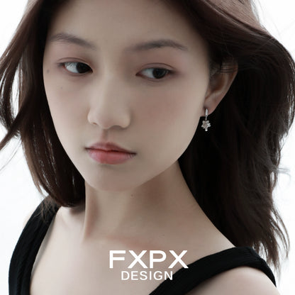 Y2K star earrings by FXPX featuring a unique design that adds a trendy touch to any outfit
