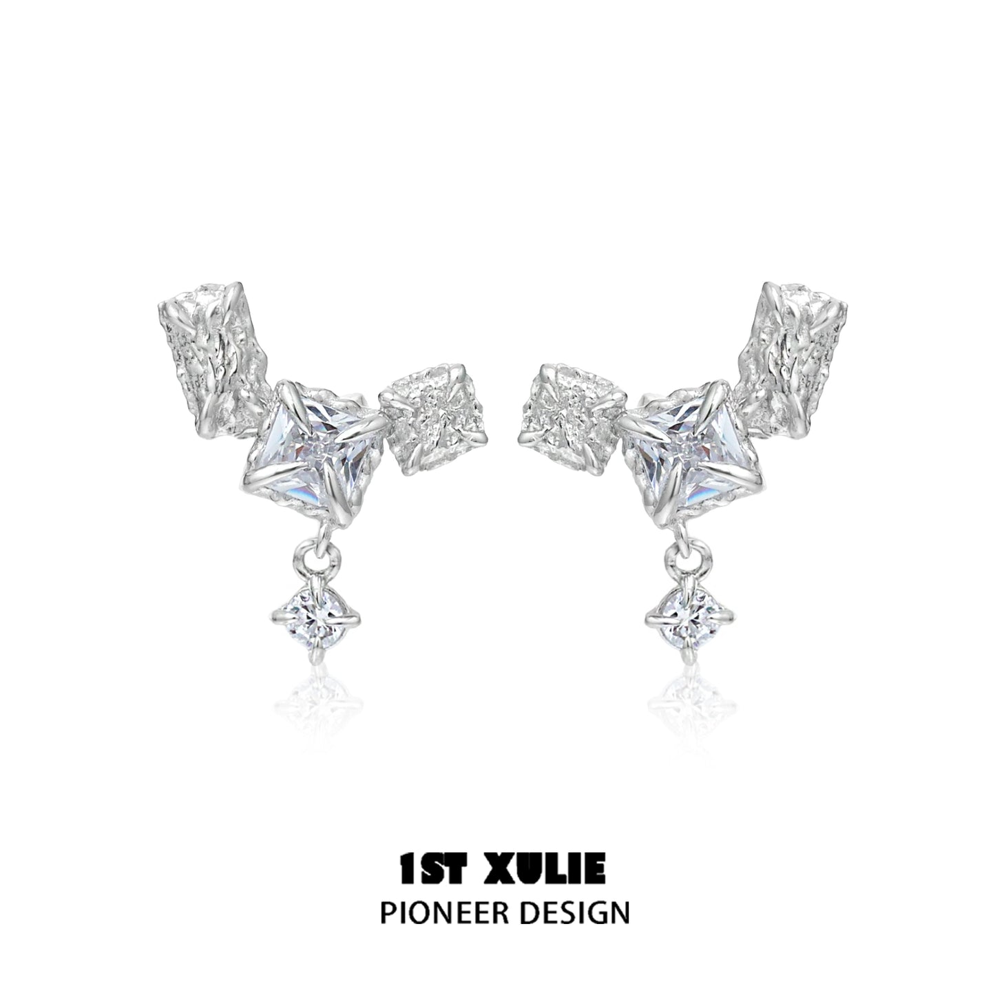 Geometric silver earrings featuring unique shapes and sparkling accents for a modern look