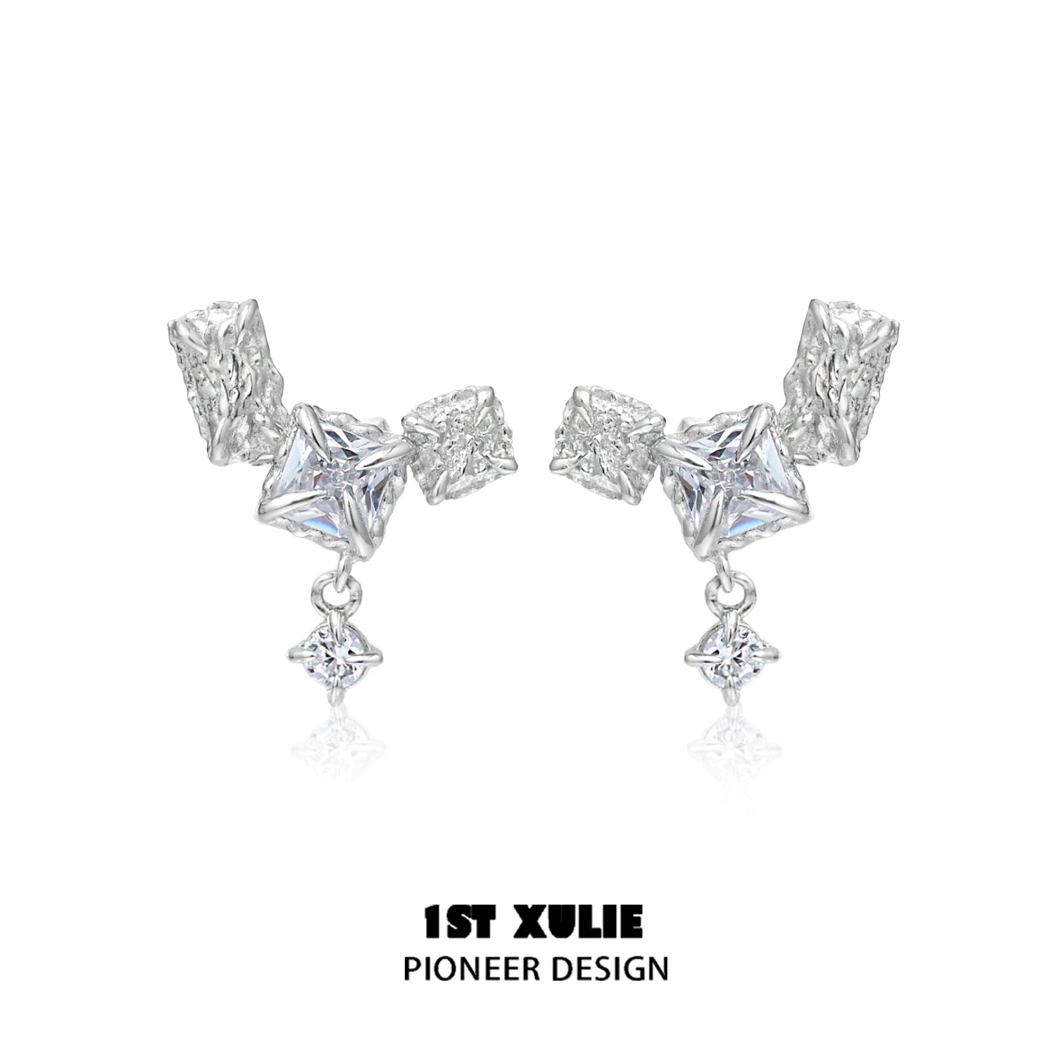Geometric silver earrings featuring unique shapes and sparkling accents for a modern look