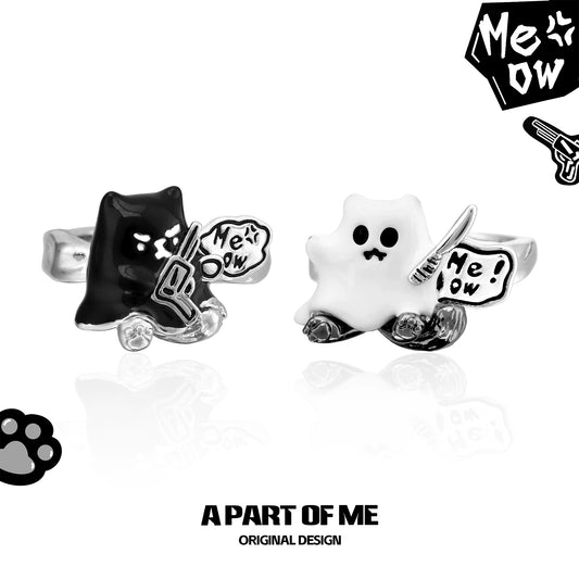 A PART OF ME ghost kitten ring featuring playful black and white kitten designs with dual charms
