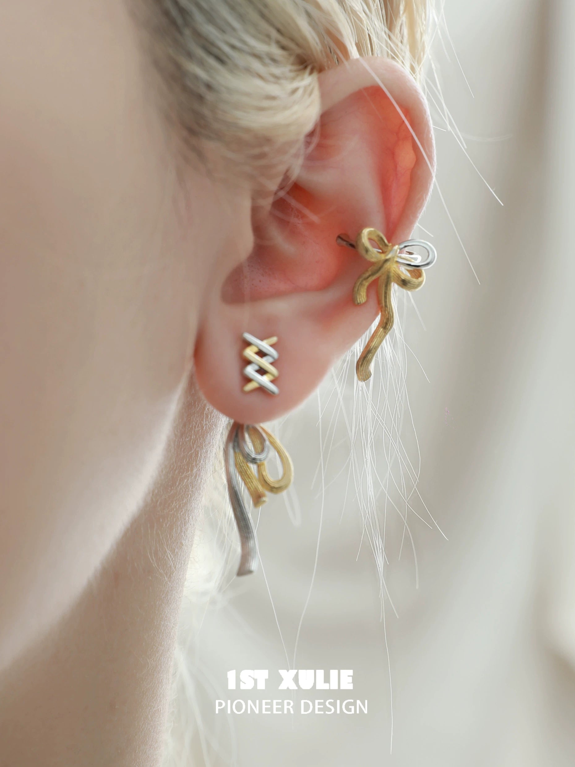 Stylish gold bow ear cuff by 1ST XULIE, elegantly designed for a trendy ear jewelry look