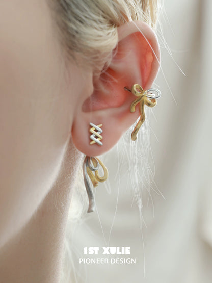 Stylish gold bow ear cuff by 1ST XULIE, elegantly designed for a trendy ear jewelry look
