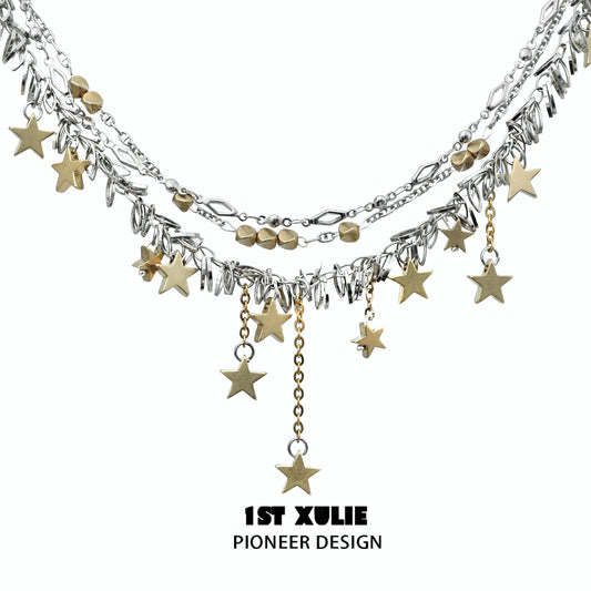 Gold star tassel necklace with layered chains and dangling star charms for stylish jewelry lovers