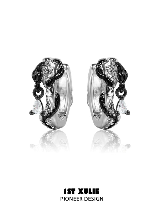 Gothic black rattlesnake earrings with intricate design and sparkling accents from 1ST XULIE