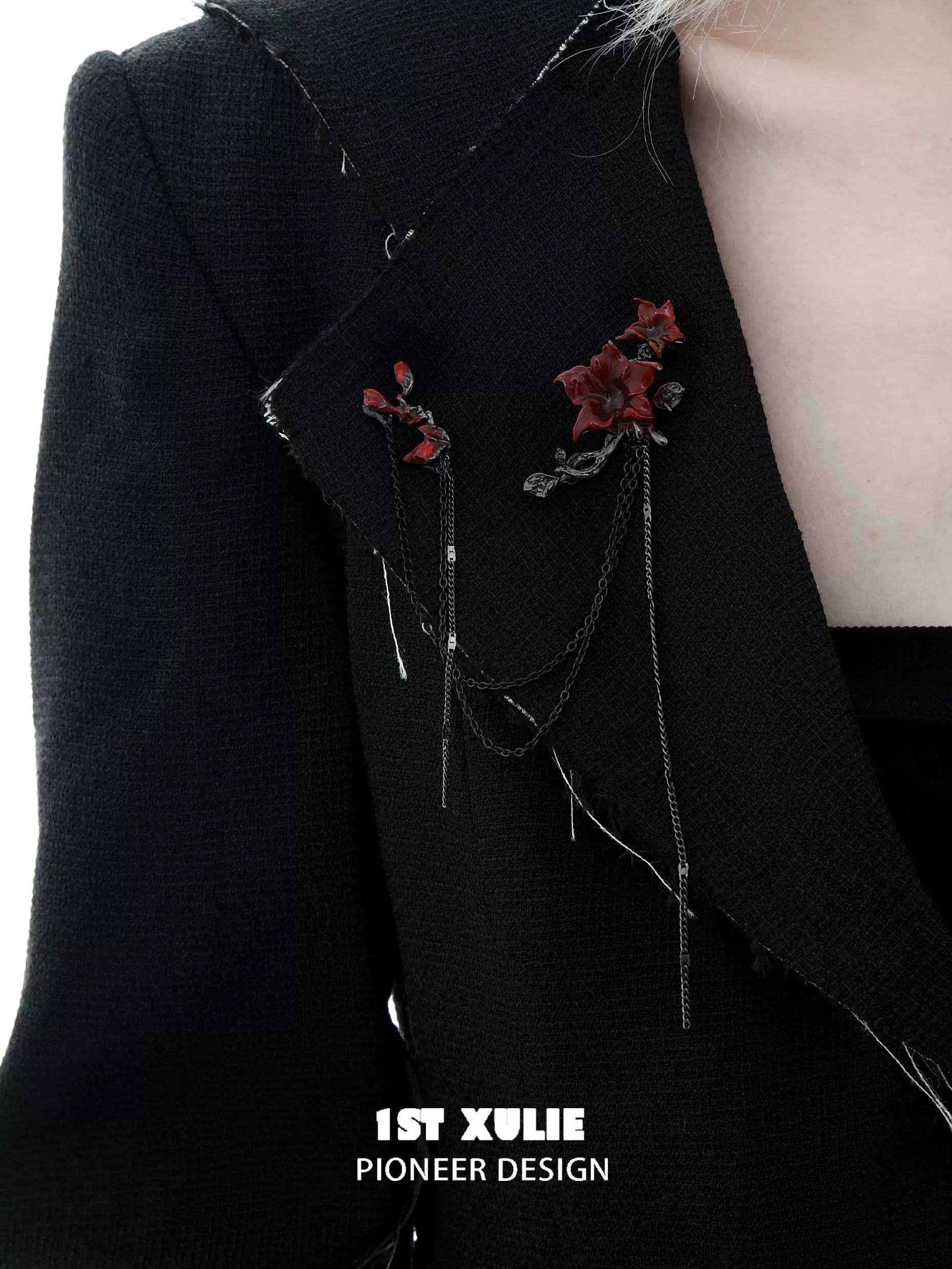 Gothic blood mandala brooch featuring intricate floral design on a black jacket