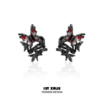 Gothic butterfly ear clip featuring intricate black and red details for a unique fashion statement