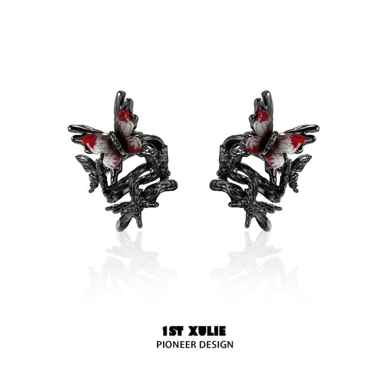 Gothic butterfly ear clip featuring intricate black and red details for a unique fashion statement