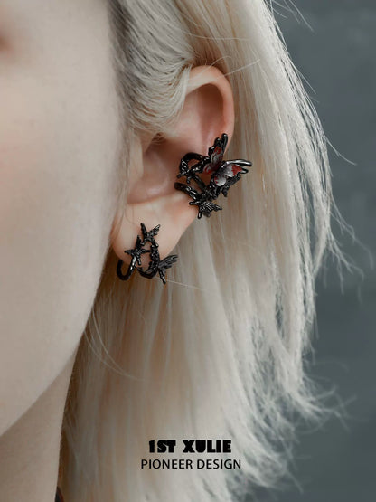 Gothic butterfly ear clip in black featuring intricate butterfly designs for a unique accessory