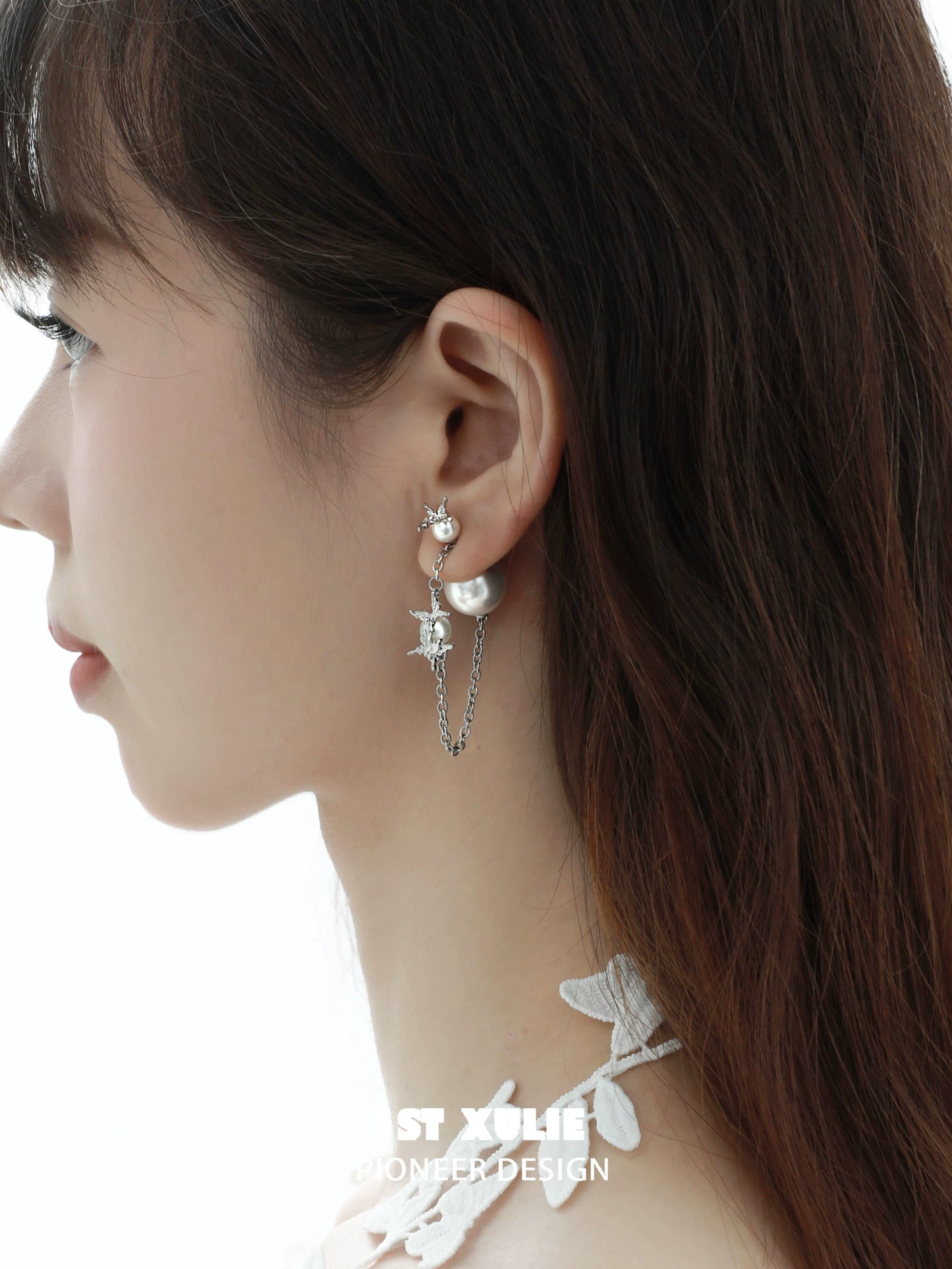 Unique gothic butterfly earrings with silver chains and star embellishments for an edgy style
