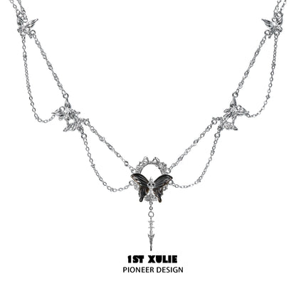 Gothic butterfly necklace by 1STXULIE featuring intricate butterfly charms and layered chains