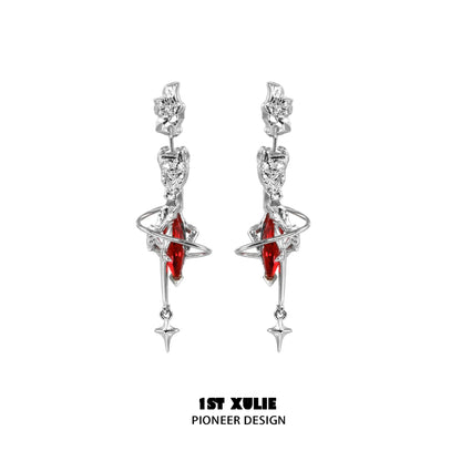Gothic dream core earrings featuring red gemstones and silver swirl design for unique style
