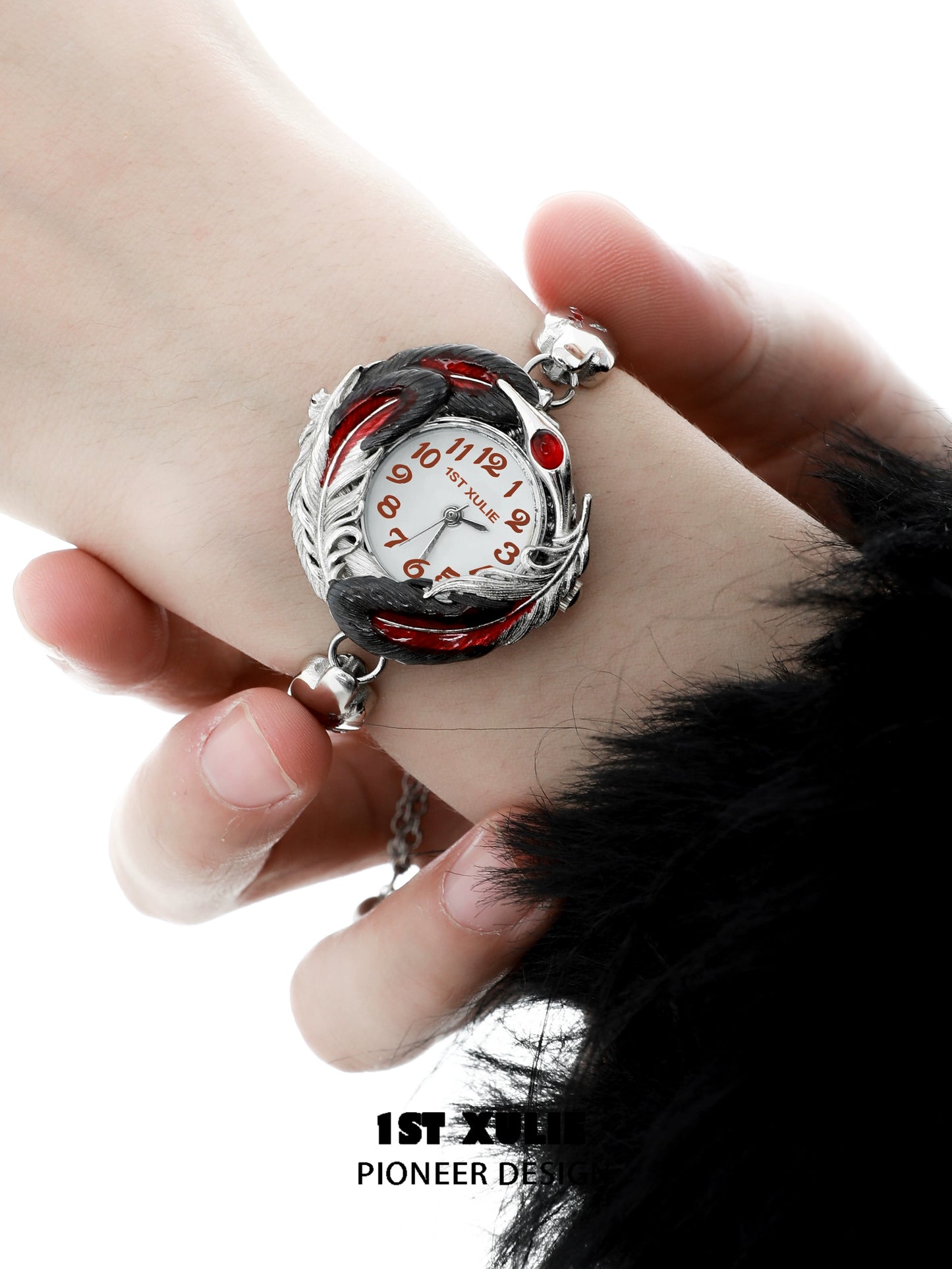 Gothic feather bracelet with a unique clock design featuring red accents and intricate details