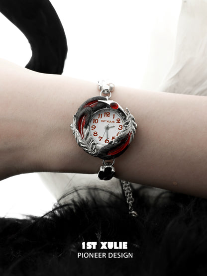 1STXULIE gothic feather bracelet with silver accents and stylish red details