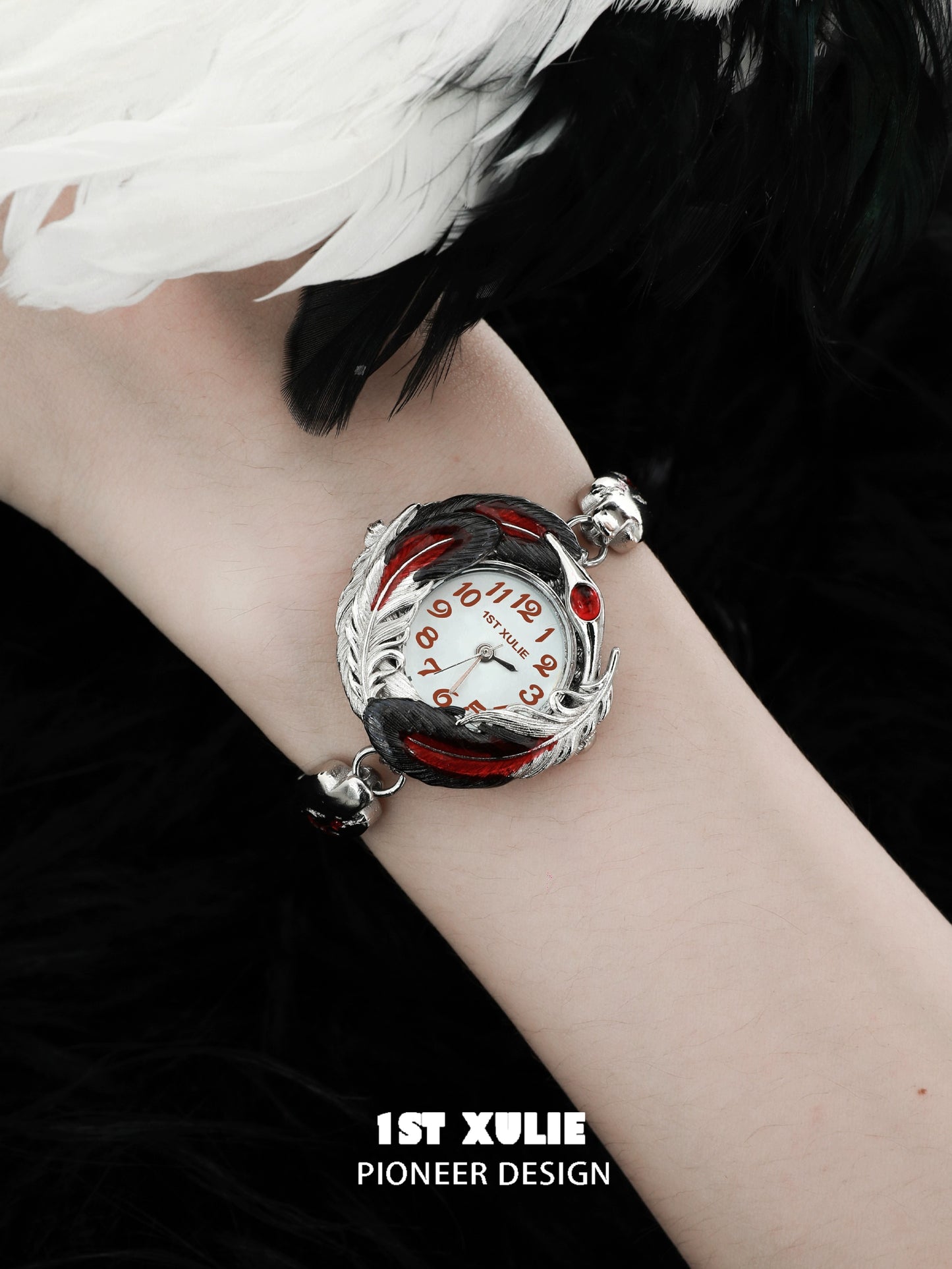 Elegant gothic feather bracelet by 1STXULIE featuring a unique watch design with red accents