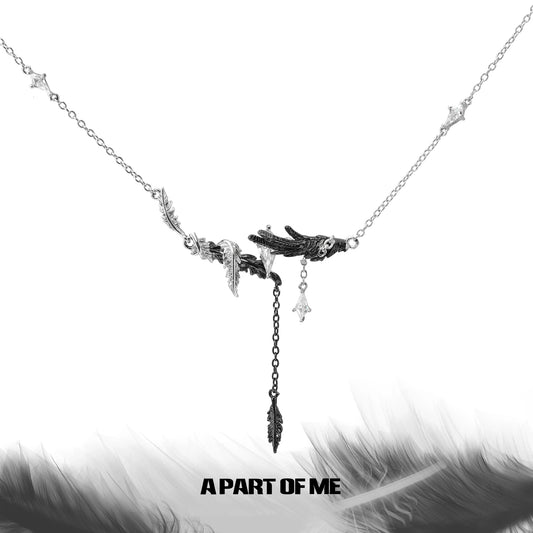 Gothic feather necklace by A PART OF ME featuring intricate feather and hand designs