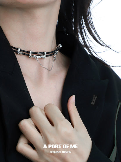 Gothic leather necklace from A PART OF ME featuring layered chains and metallic accents for a stylish look
