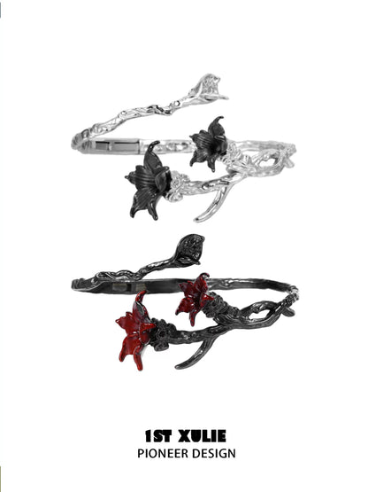 Gothic mandala bracelet by 1STXULIE featuring black and red floral accents on a twisted design