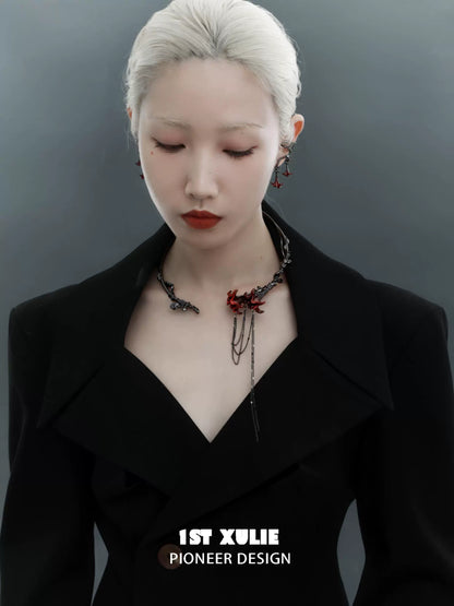Fashion model showcasing gothic mandala ear cuffs paired with a stylish black coat