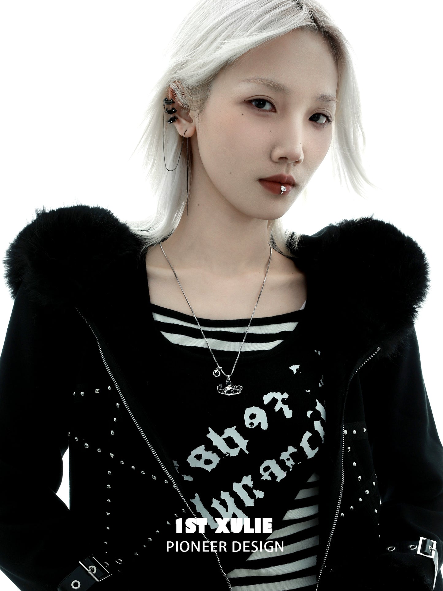 Gothic night owl cat necklace showcased on model wearing a stylish black jacket and striped shirt
