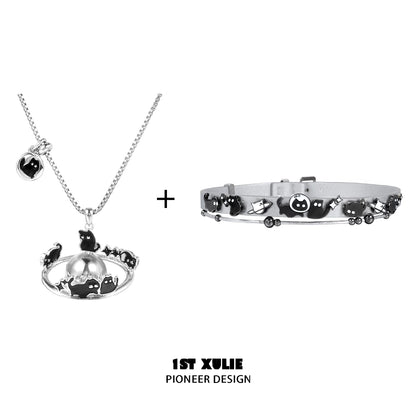 Gothic night owl cat necklace with silver chain and charms for unique fashion statement