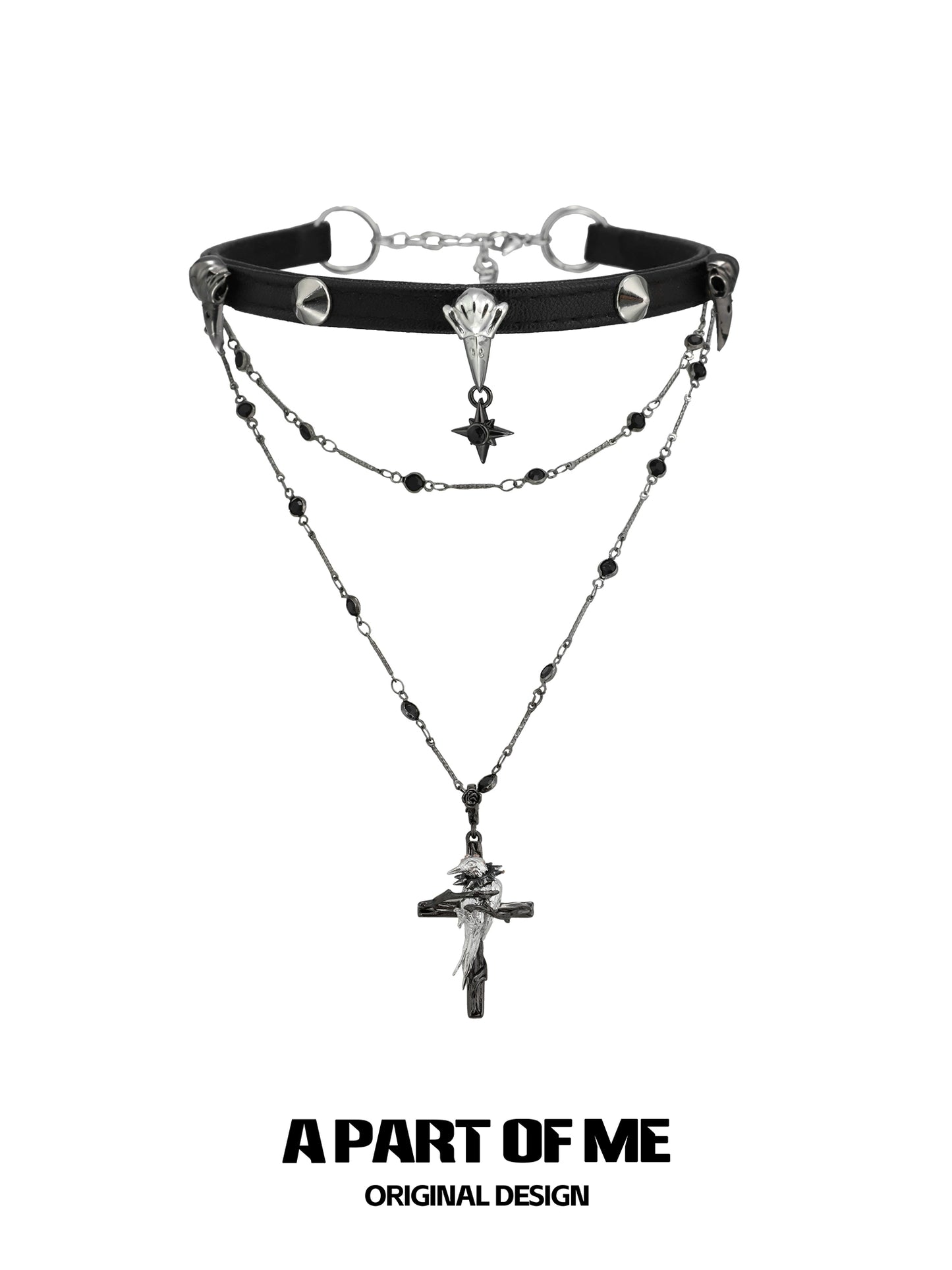A PART OF ME gothic raven cross necklace featuring layered chains and detailed charms for a unique look