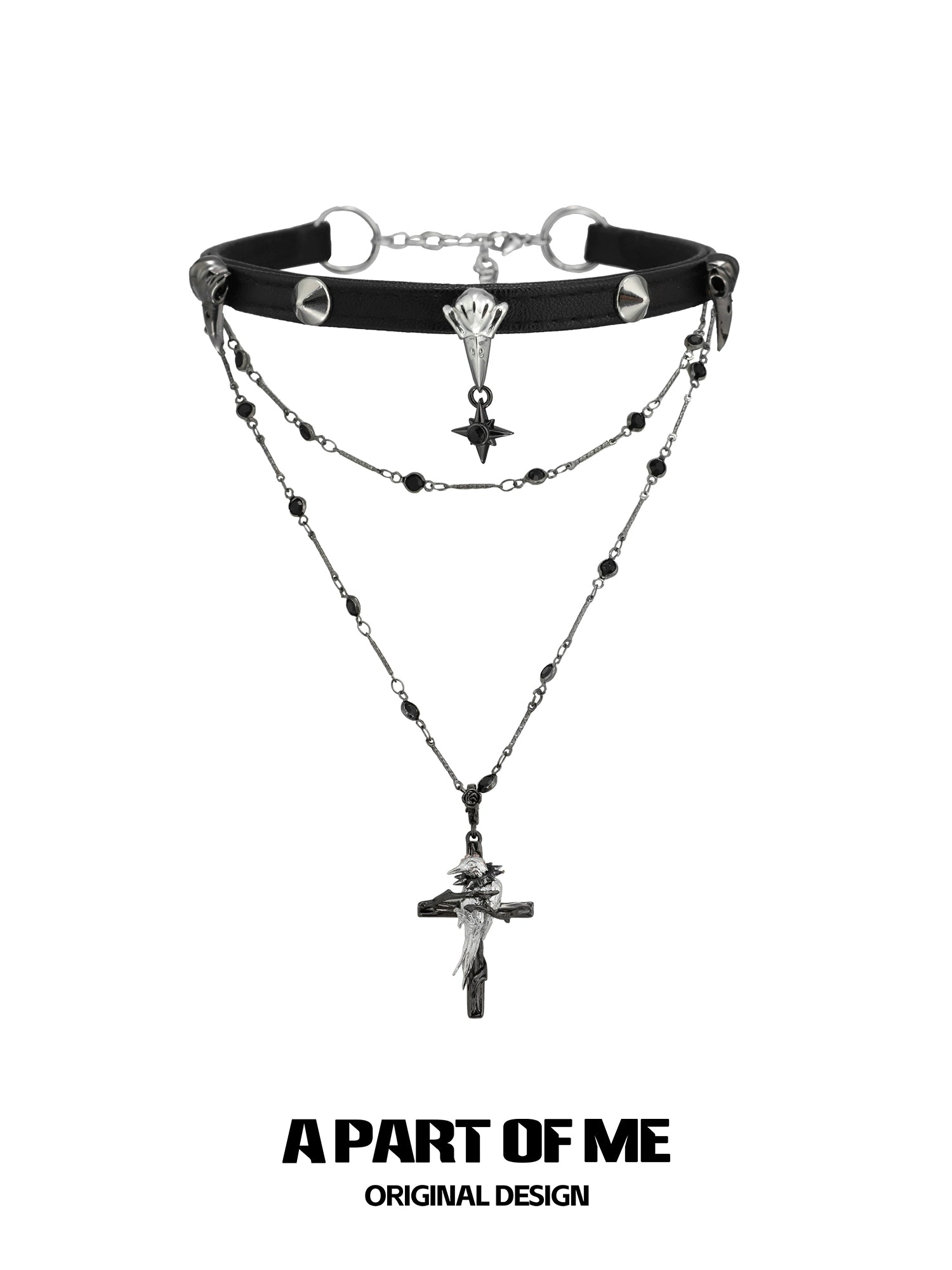 A PART OF ME gothic raven cross necklace featuring layered chains and detailed charms for a unique look