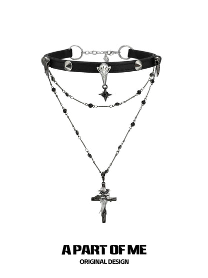 A PART OF ME gothic raven cross necklace featuring layered chains and detailed charms for a unique look
