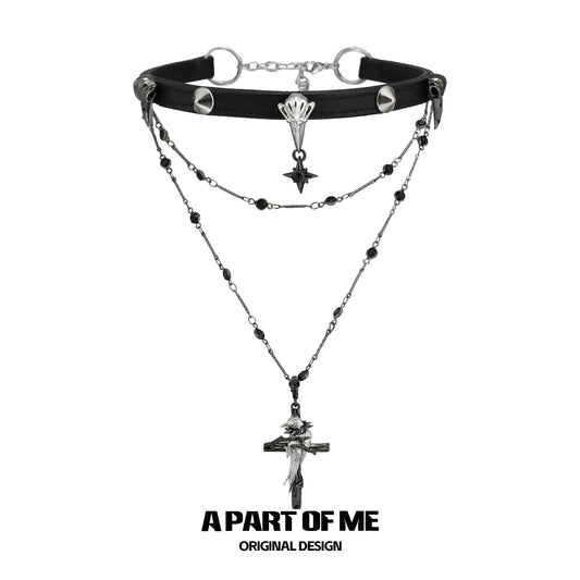 Gothic raven cross necklace with layered chains and black accents for a dark, stylish look