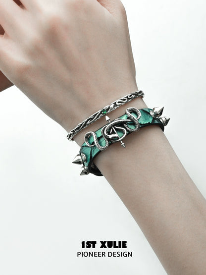 1ST XULIE gothic snake bracelet crafted with intricate details and spikes for a bold look.