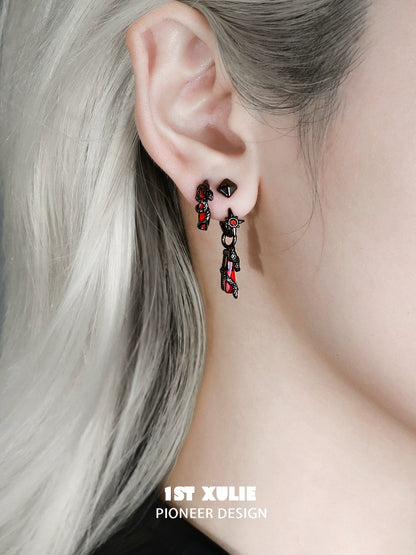Unique gothic snake earrings with red and black design, perfect for a bold fashion statement