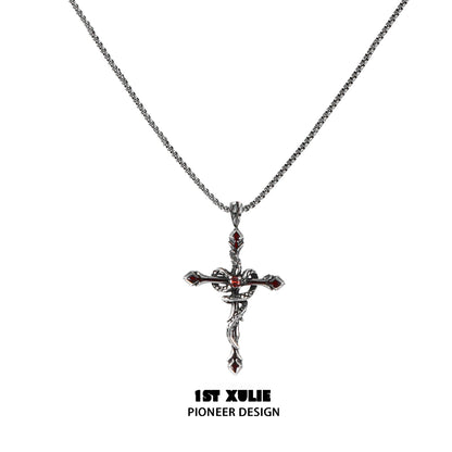 Gothic snake necklace with a detailed silver cross pendant and intricate design by 1STXULIE