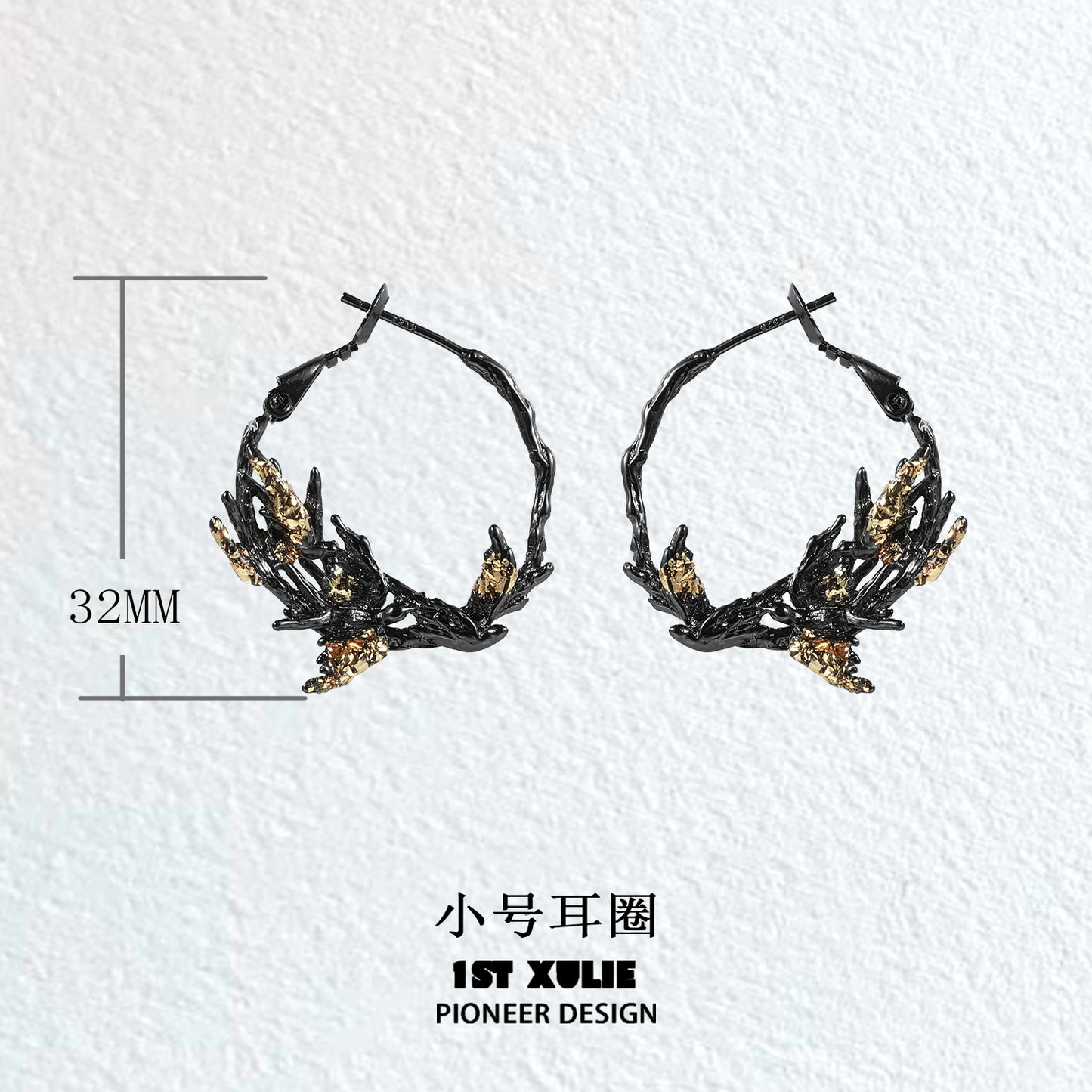 Gothic swallow earrings in black and gold design, featuring a unique twisted hoop shape