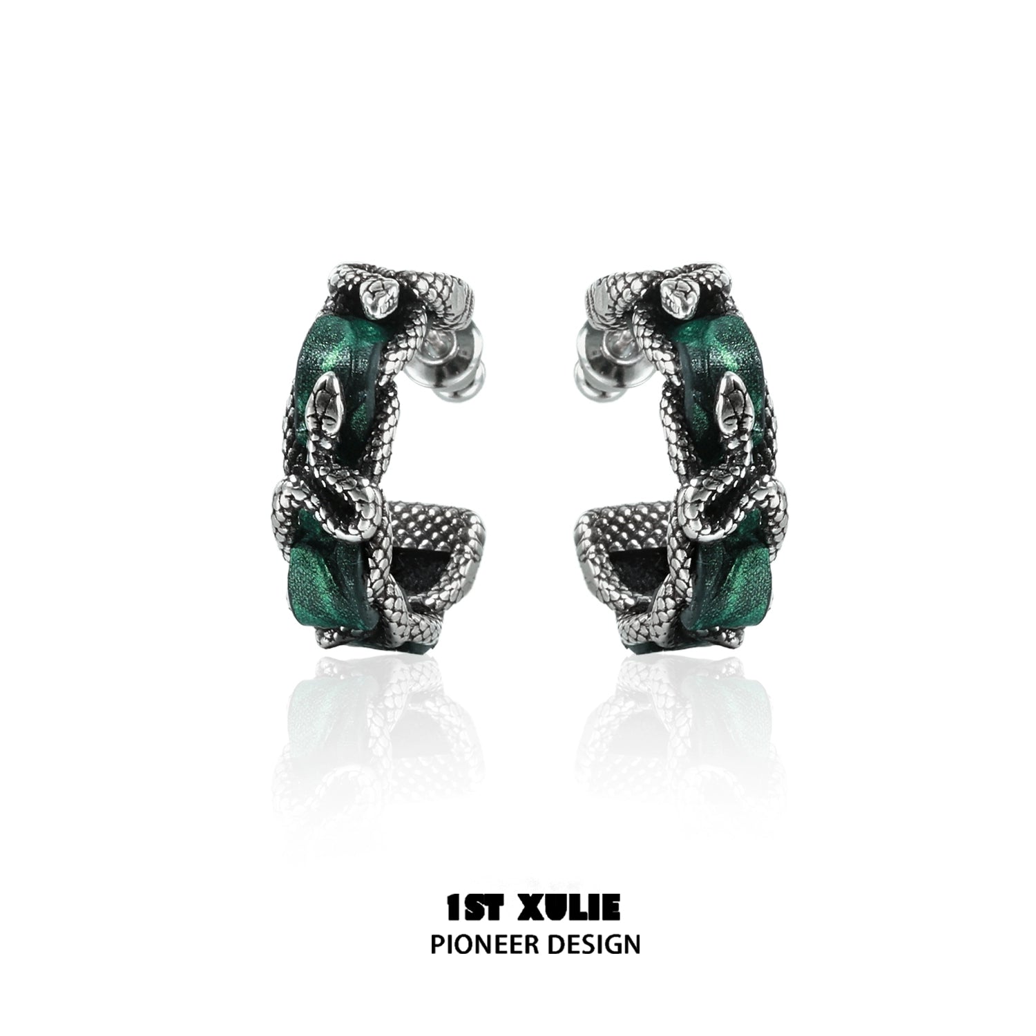 Gothic venomous spirit earrings featuring intricate design with silver tones and green accents for a bold look