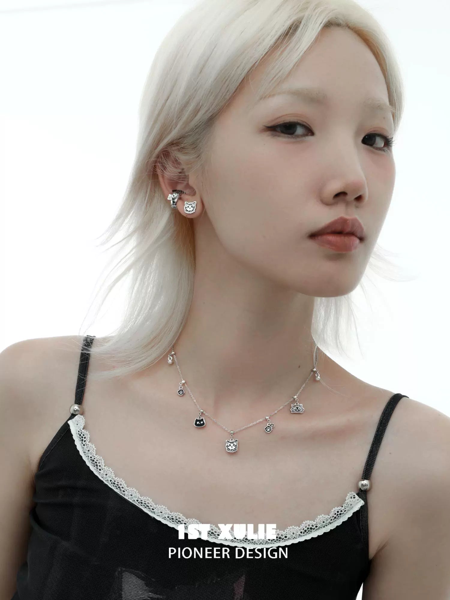 Graffiti cat sterling silver necklace featuring elegant charm designs for stylish looks