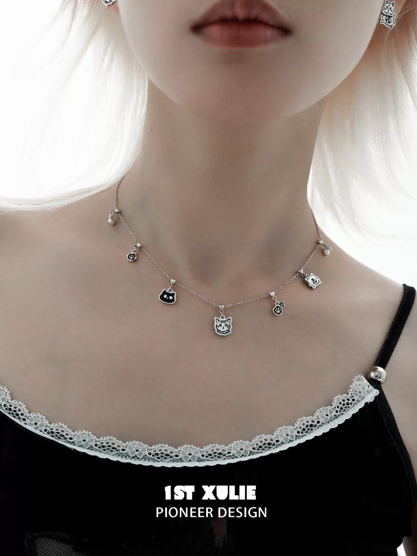 Graffiti cat sterling silver necklace with charming cat pendants on a delicate chain