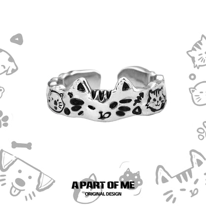 Graffiti pet couple rings featuring playful cat designs in polished silver finish