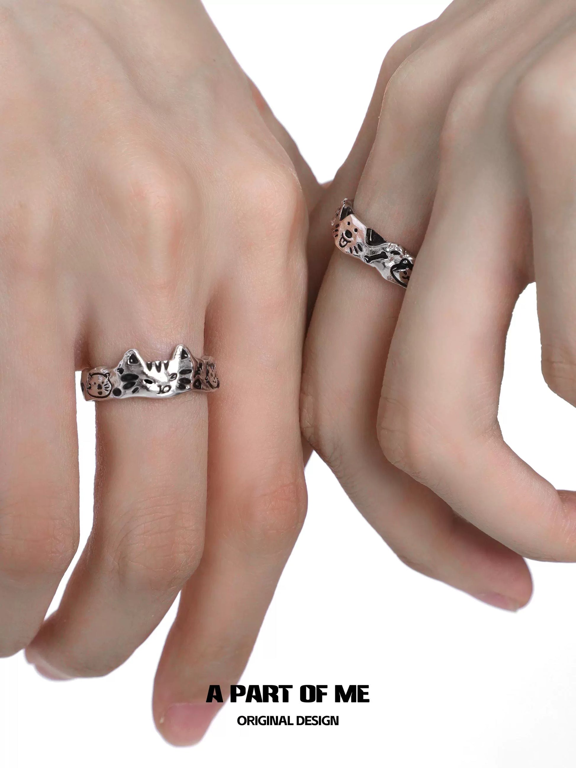 A pair of A PART OF ME graffiti pet couple rings featuring cat and dog designs for animal lovers