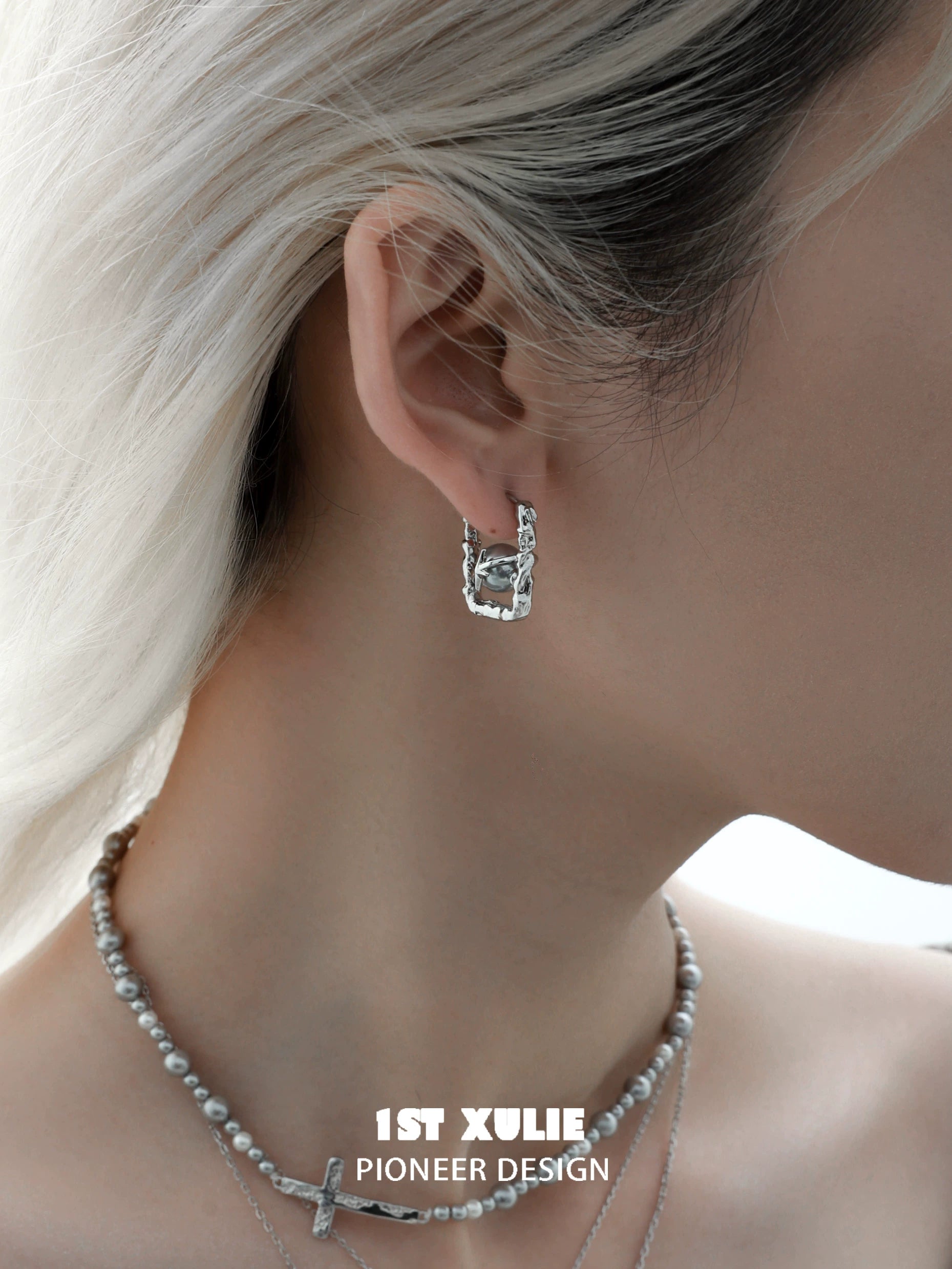 Stylish gray pearl star earrings featuring a unique design for elegant outfits