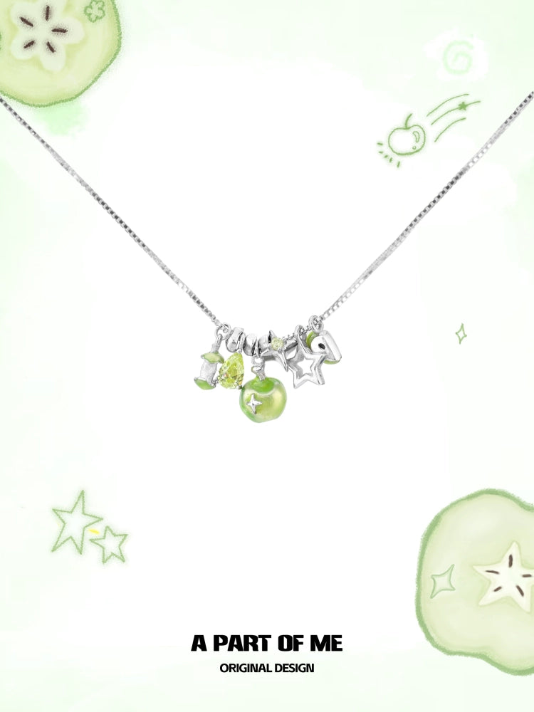A silver chain necklace featuring a green apple star necklace design with colorful charms