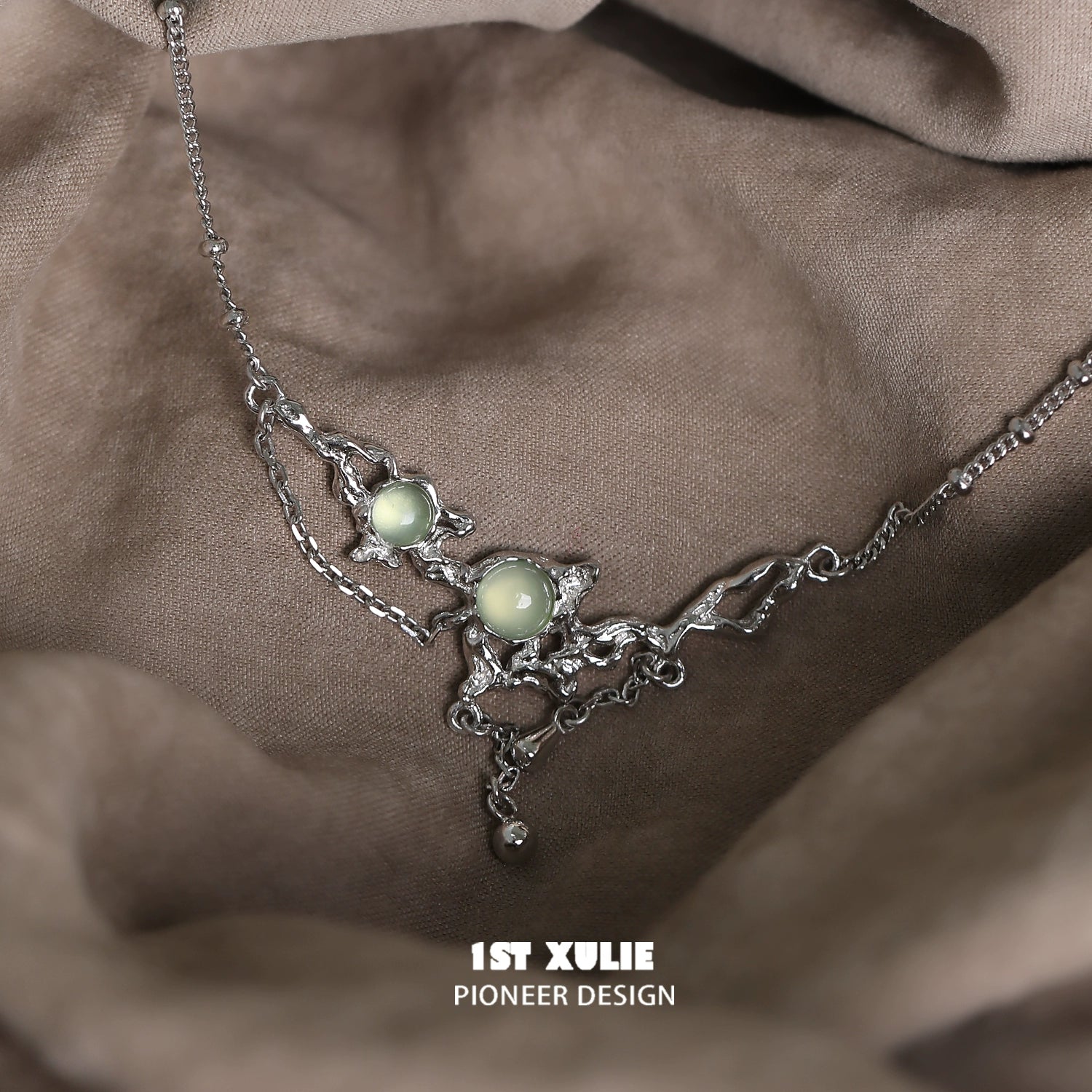 Unique 1STXULIE green gem silver necklace featuring elegant design and shimmering gems