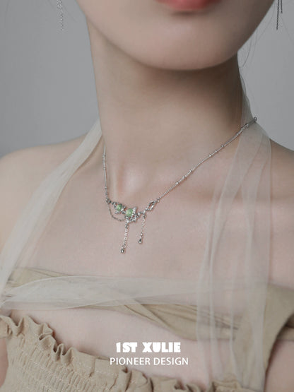 Elegant green gem silver necklace featuring sparkling accents for a chic look