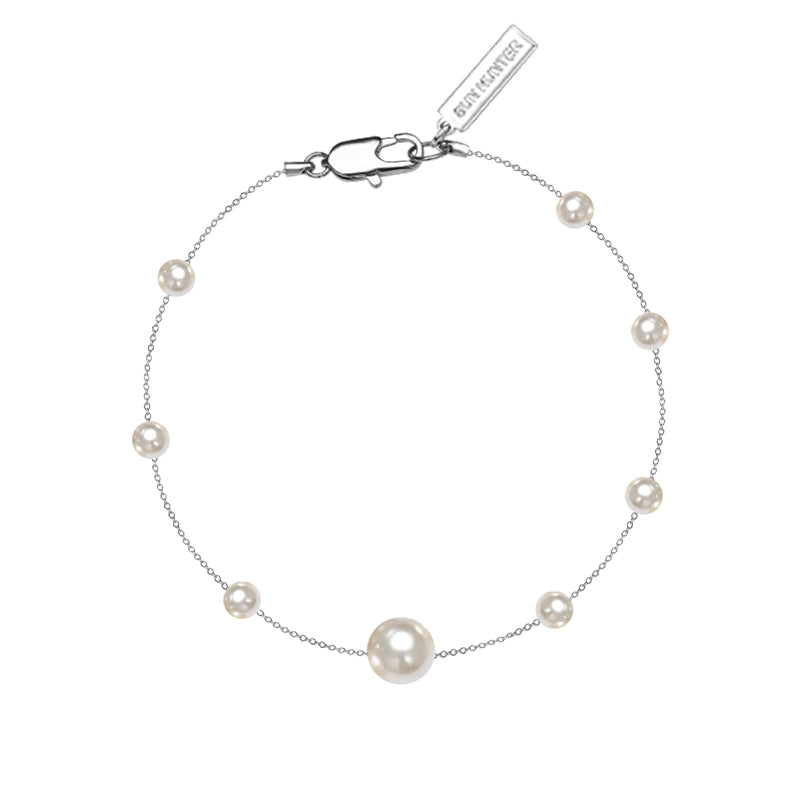 SUN HUNTER gypsy star pearl bracelet featuring delicate pearls on a silver chain