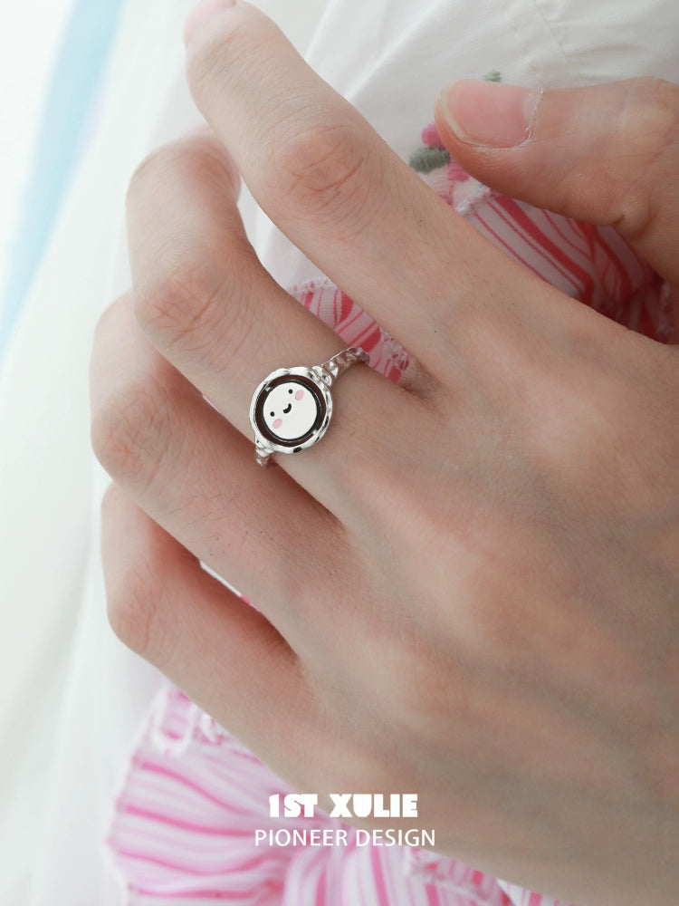 Happy mood silver ring featuring a cheerful smiley face design on a delicate band