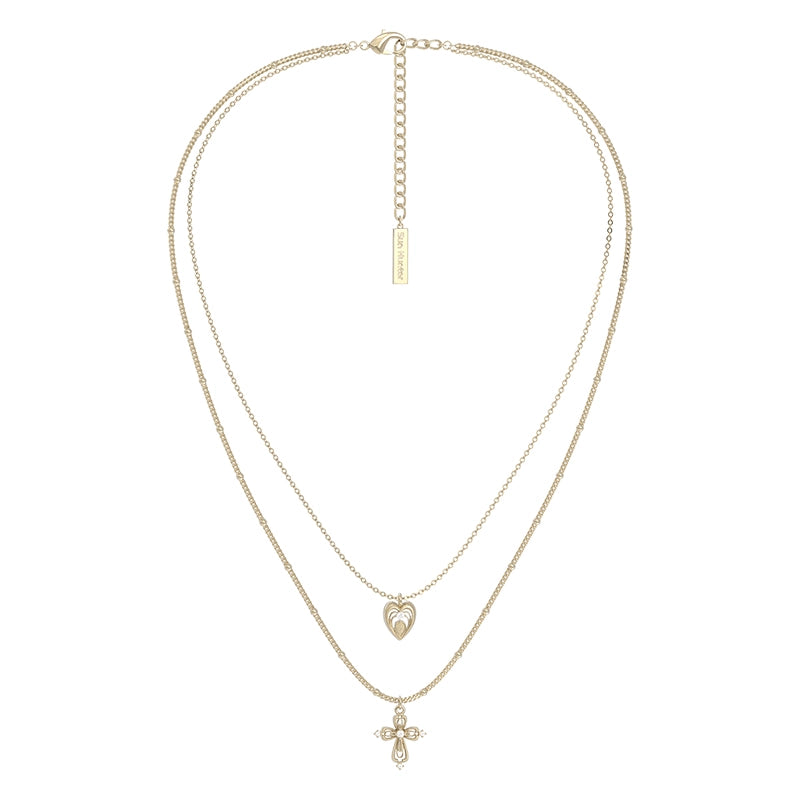 Heart cross double layer necklace from SUN HUNTER featuring elegant gold chains and unique charms