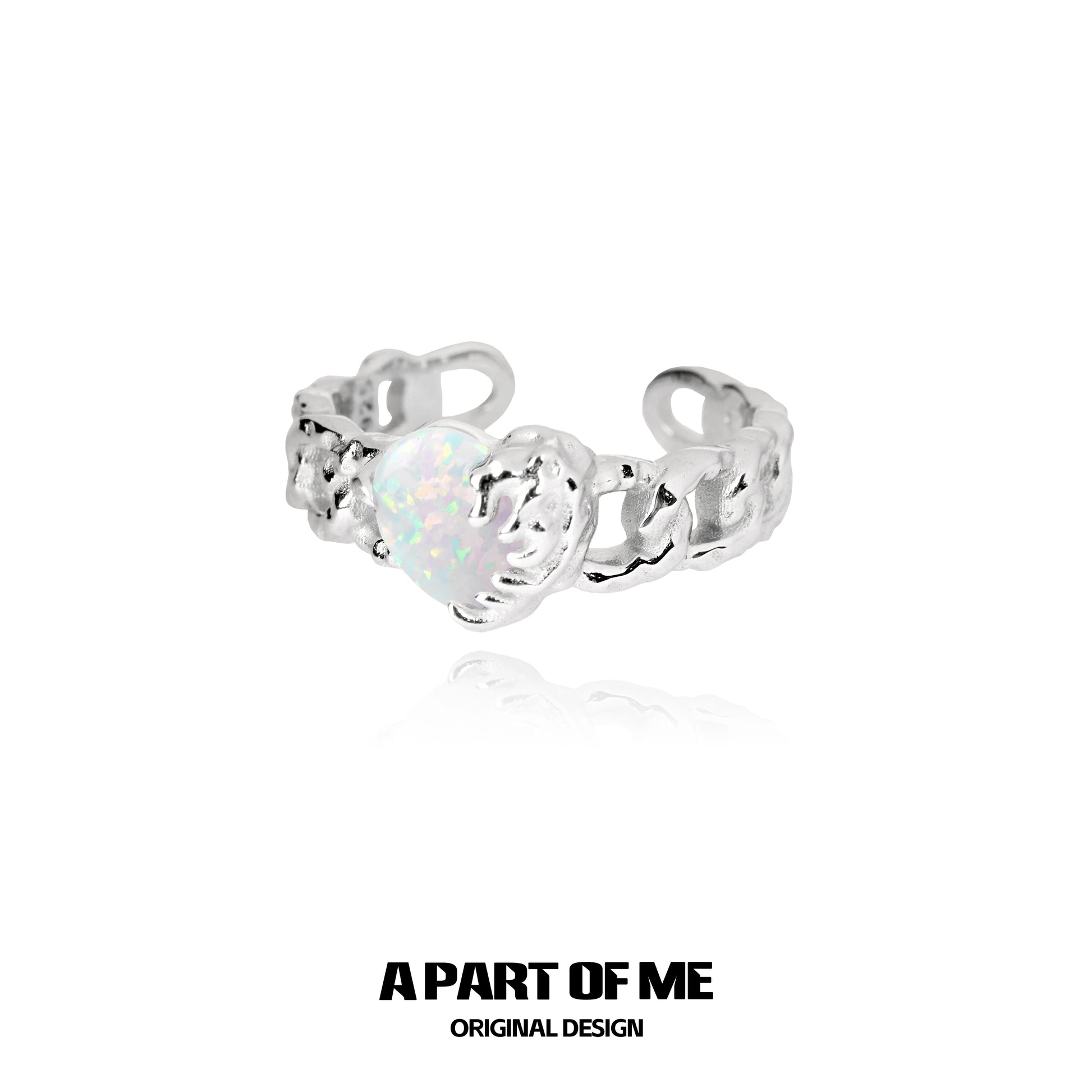A PART OF ME heart vow ring in silver featuring an iridescent heart design