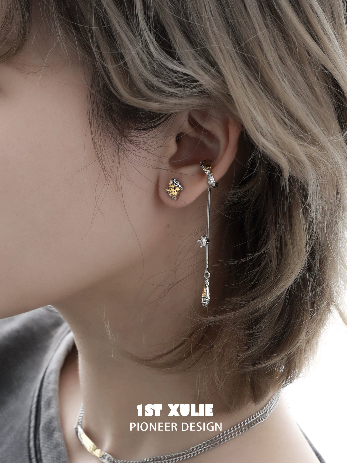 Elegant immortal love letter ear clips featuring gold and silver designs for a unique accessory look