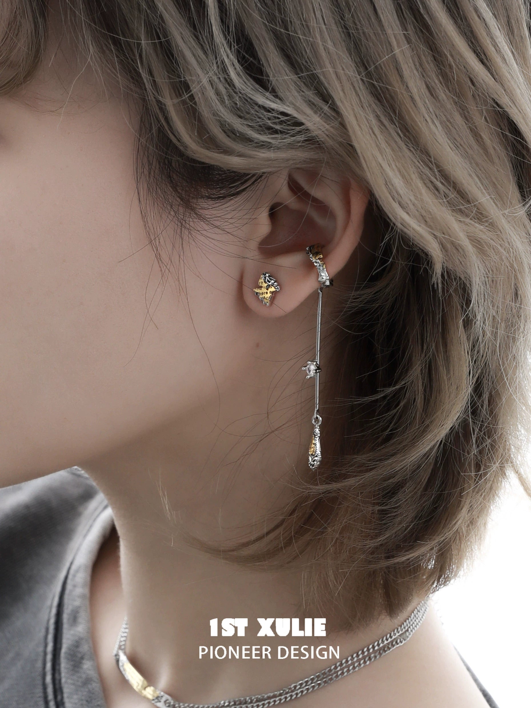 Elegant immortal love letter ear clips featuring gold and silver designs for a unique accessory look