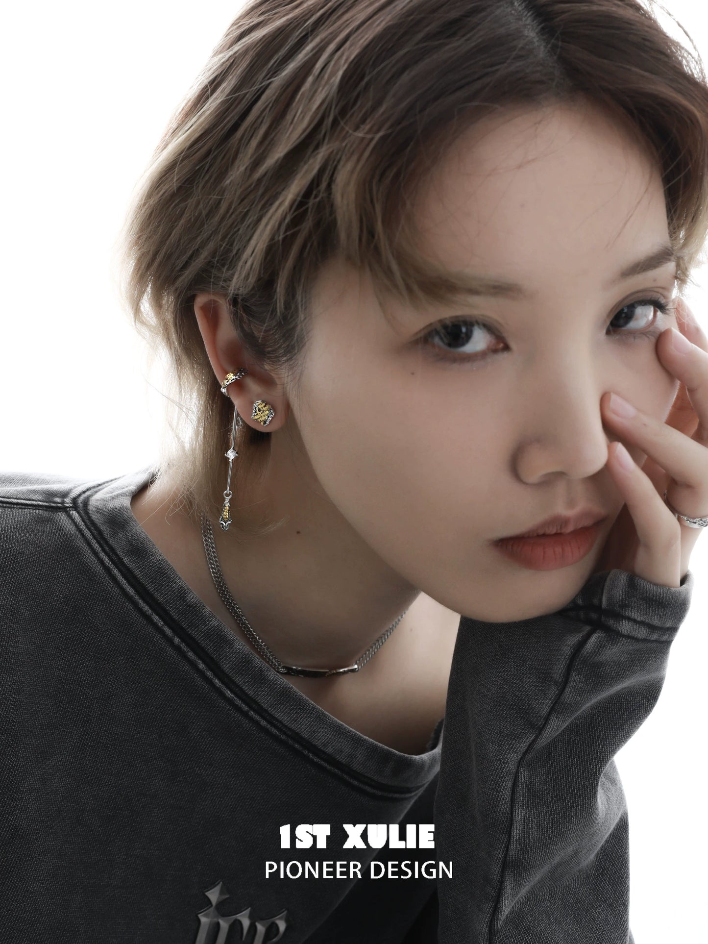 Stylish immortal love letter ear clips showcased on a model with a casual outfit