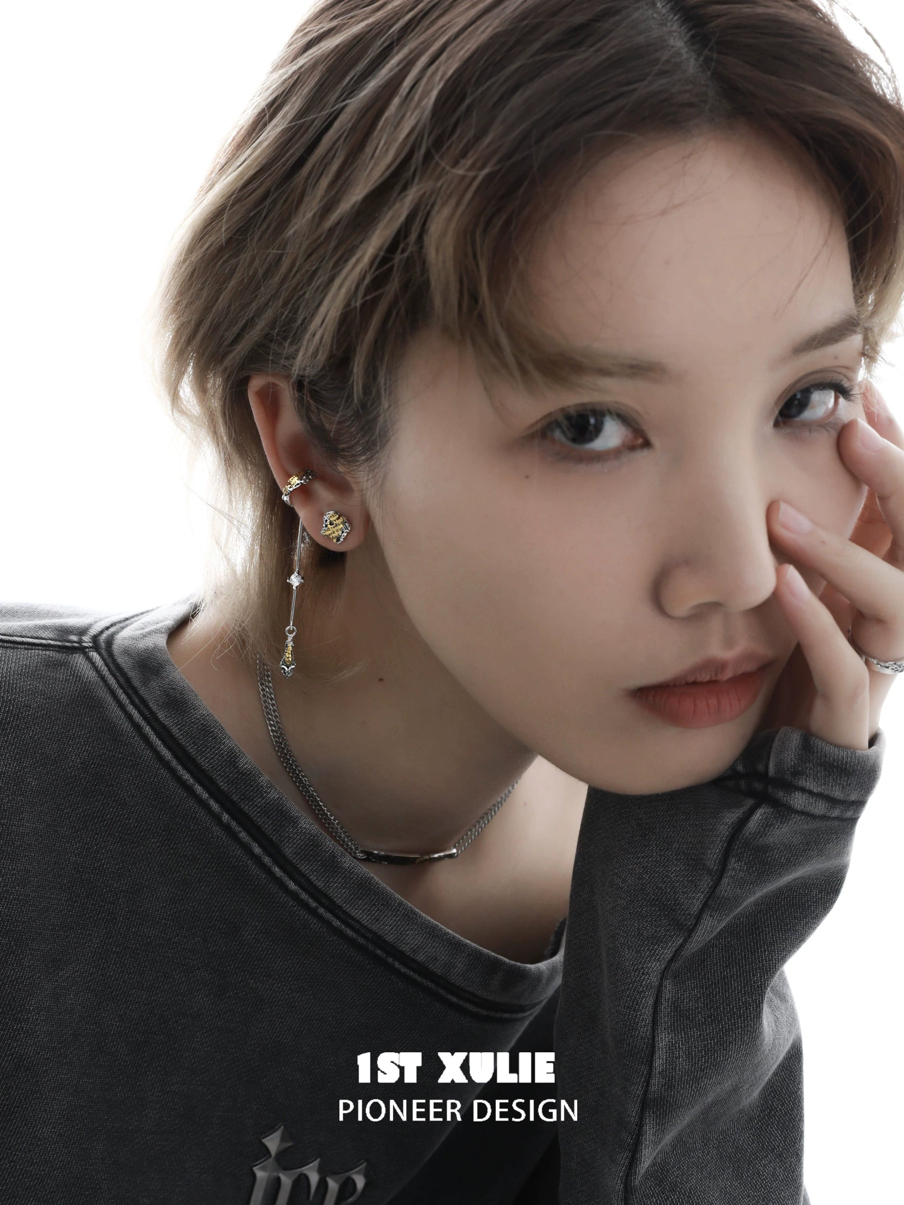 Stylish immortal love letter ear clips showcased on a model with a casual outfit