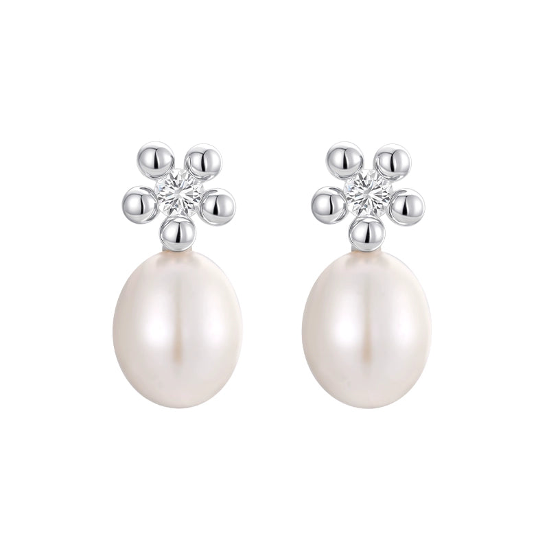 Elegant island flower pearl earrings with silver accents and sparkling details for a stylish look